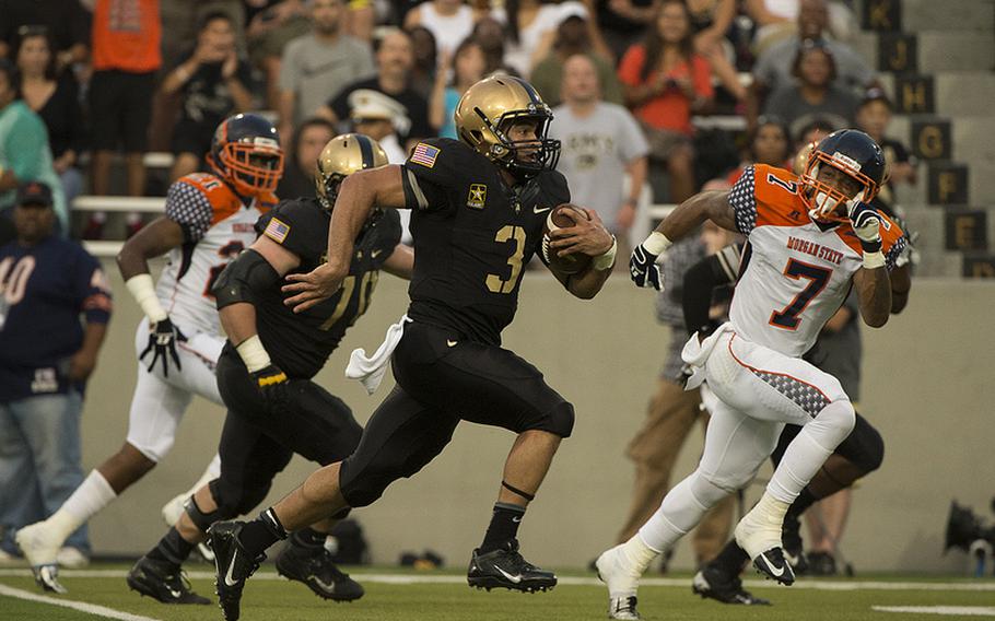 Making just his second career start, junior Angel Santiago combined for 221 total yards of offense to lead the Army football team to a 28-12 victory over visiting Morgan State Aug. 30, 2013, at Michie Stadium. 