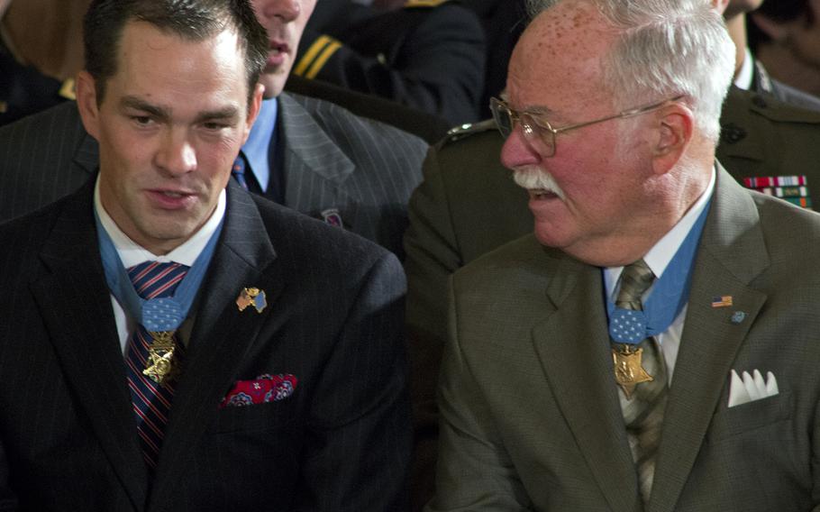 Medal of Honor recipients chat before the ceremony starts.