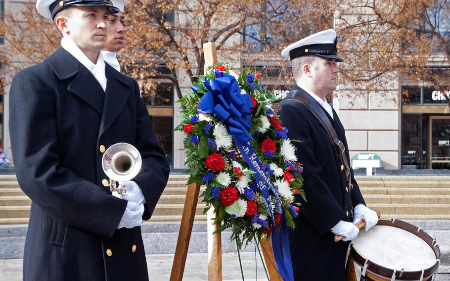 Sailors wait for the wreath laying during the Pearl Harbor Remembrance Day in Washington, D.C.