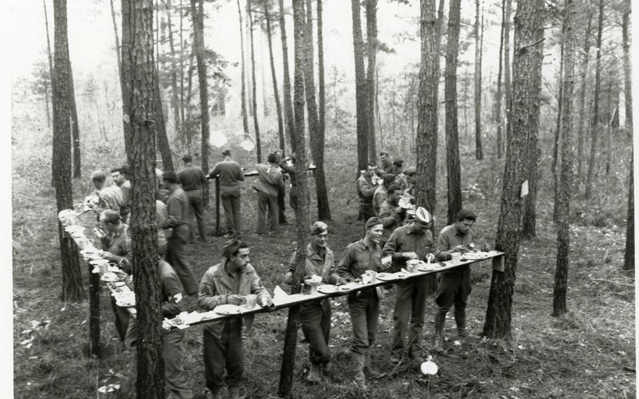 Soldiers from Headquarters, 44th Infantry Division, composed of elements from the New Jersey and New York National Guards, eat Thanksgiving dinner in the closing days of the Carolina Maneuvers, November 1941.