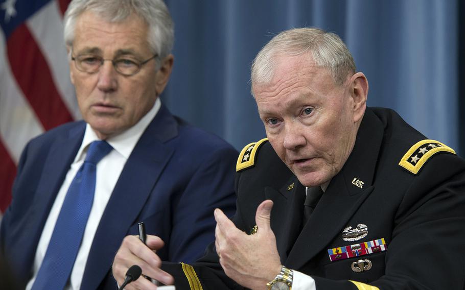 Secretary of Defense Chuck Hagel and Chairman of the Joint Chiefs of Staff Gen. Martin E. Dempsey brief the press at the Pentagon, Dec. 19, 2013.