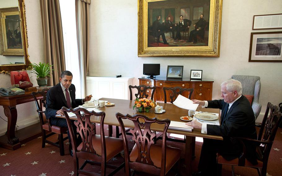 President Barack Obama has lunch with Secretary of Defense Robert Gates in the Oval Office private dining room on Feb. 11, 2011.