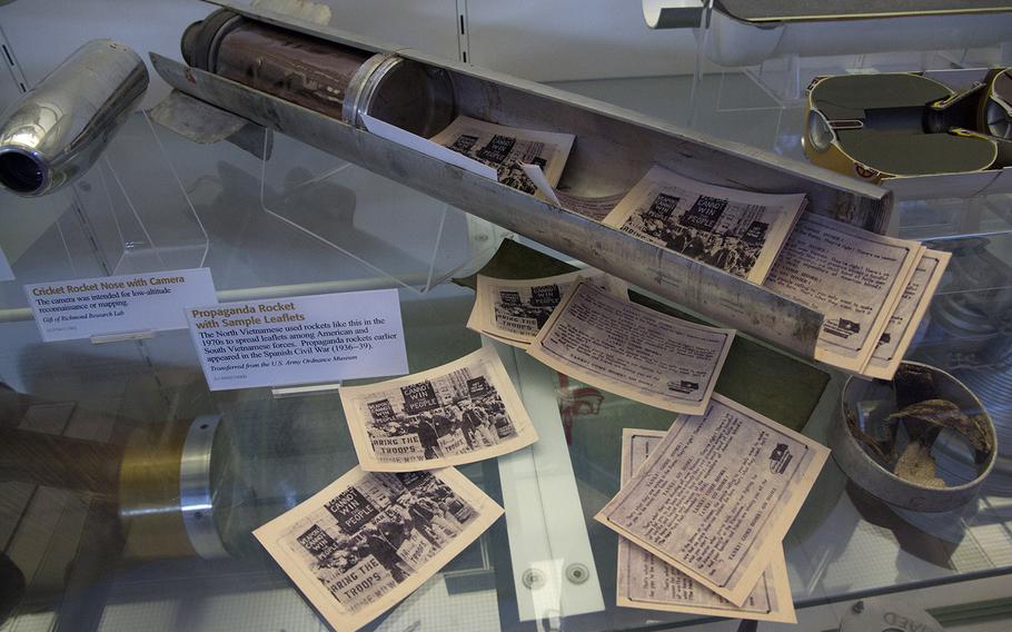 A North Vietnamese propaganda rocket and leaflets, at the National Air and Space Museum's Steven F. Udvar-Hazy Center, November, 2013. The leaflets, showing antiwar protests in the U.S., were sent toward American and Vietnamese troops.