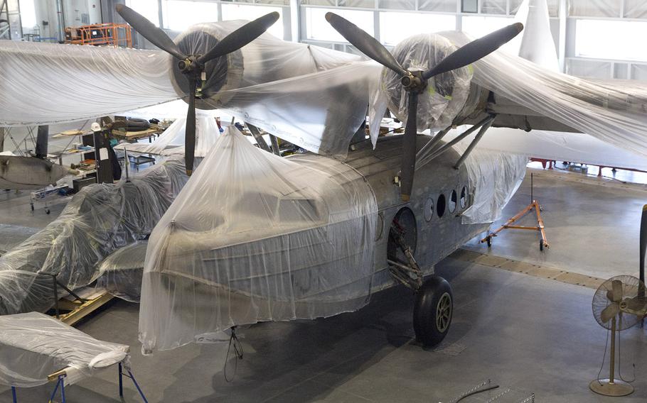 At the National Air and Space Museum's Steven F. Udvar-Hazy Center, a Sikorsky JRS-1 aircraft is covered during restoration work in November, 2013. The plane was sent out to search for the Japanese fleet after the attack on Pearl Harbor in December, 1941.