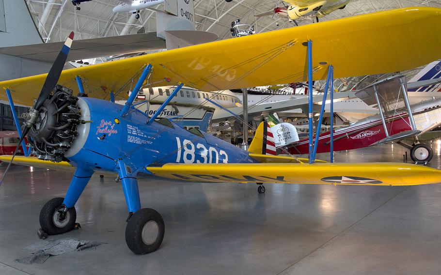 The Boeing-Stearma  PT-13D Kaydet "Spirit of Tuskegee," at the National Air and Space Museum's Steven F. Udvar-Hazy Center, November, 2013. The plane was used to train the famed Tuskegee Airmen during World War II; it was used as a crop duster after the war, and restored in recent years by Air Force Capt. Matt Quy and his wife, Tina.