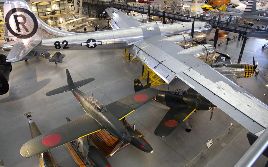 World War II Japanese aircraft on display beneath the giant wing of the B-29 Superfortress "Enola Gay," at the National Air and Space Museum's Steven F. Udvar-Hazy Center, November, 2013. The plane at hte bottom is the M6A1 Seiran (Storm from a Clear Sky) torpedo-bomber, which was designed to be launched from a submarine. (See story: http://www.stripes.com/news/researchers-unravel-the-mystery-of-japan-s-400-foot-aircraft-launching-submarine-1.258067) 