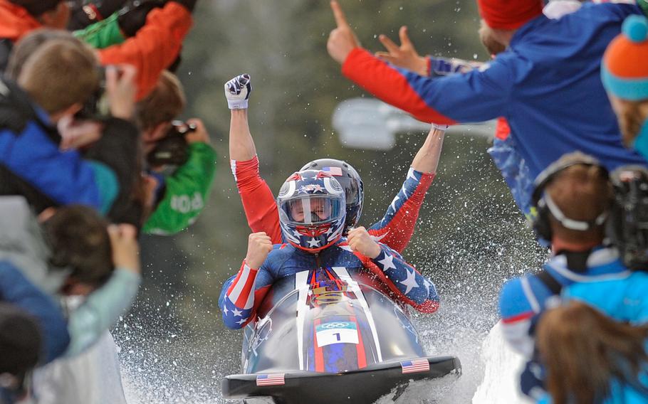 The USA-1 four-man bobsled completes its first-place finish in Whistler, Canada, Feb. 27, 2010. It was the first gold medal in four-man bobsled for the United States in 62 years.