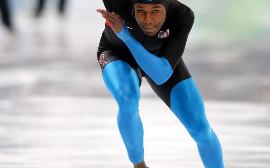 Shani Davis of the United States pushes away from the start line on his way to winning the gold medal in the men'1000 meter Speed Skating event during the 2010 Winter Olympics in Vancouver, B.C. This year at Sochi, Davis will try to become the first male skater to win the same event at three straight Olympics.