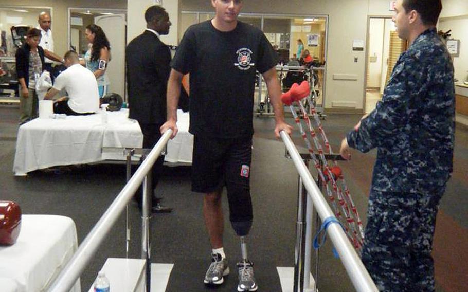 1st Lt. Josh Pitcher takes his 1st steps with a new prosthetic limb after losing his left leg in an IED attack in Kandahar Province mid-2012. Pitcher returned to Afghanistan 1 1/2 years later as a paratrooper with the 508th Parachute Infantry Regiment, 82nd Airborne Division.