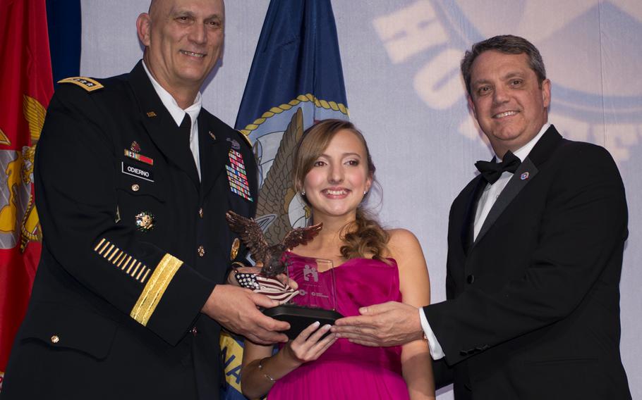 Kenzi Hall, who founded her own non-profit Bratpack 11 to help military children “live their dream,” receives her Military Child of the Year award from Gen. Ray Odierno on April 10, 2014, in Arlington, Virginia. Each service branch was represented that night, and Hall was representing the Army. 
