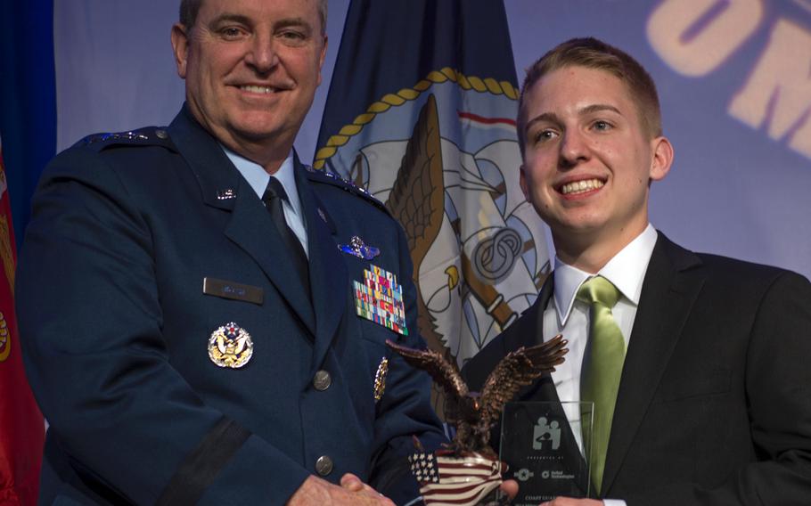 Gen. Mark Welsh poses for a photo with Military Child of the Year Gage Alan Dabin, who was representing the Air Force, on April 10, 2014. Each of the five service branches were represented.