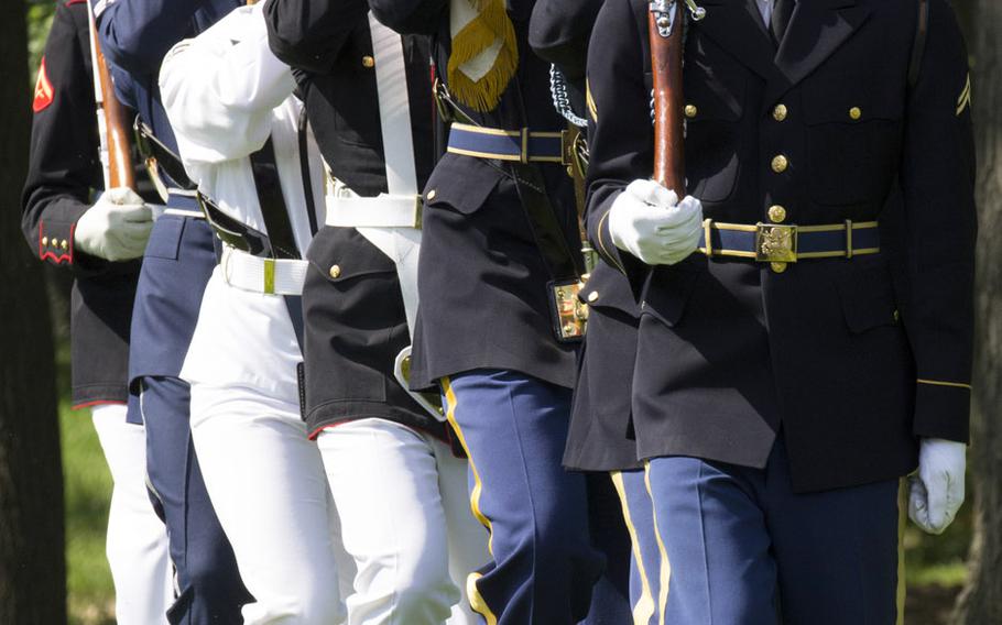 The color guard at a ceremony at the Vietnam Veterans Memorial in Washington, D.C. on May 11, 2014 marking the addition of 13 names to the Wall and the change of status of eight others.