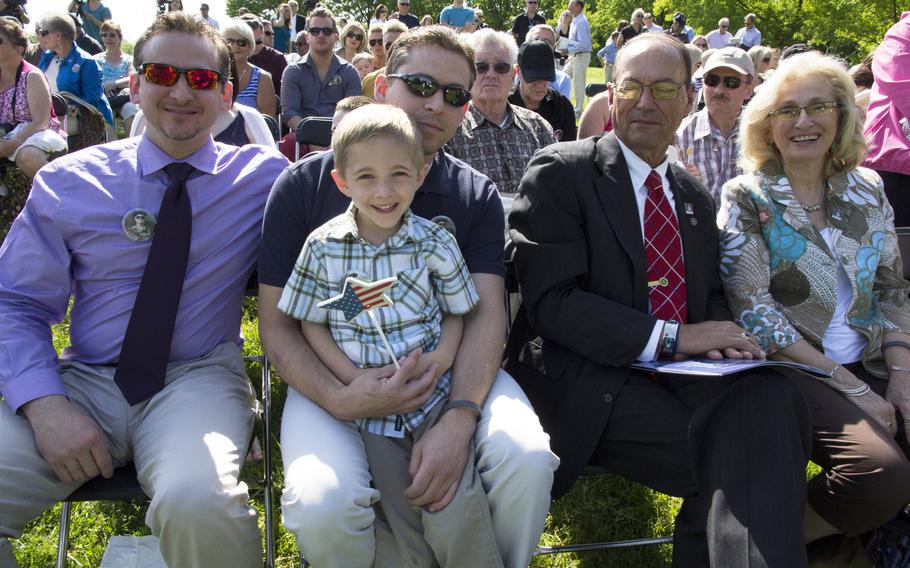 Relatives of Henry J. Drozdowski Jr. await the start of a ceremony at the Vietnam Veterans Memorial in Washington, D.C. on May 11, 2014 marking the addition of 13 names to the Wall and the change of status of eight others.