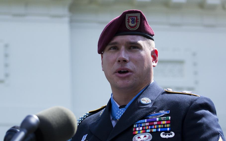 Former Army Sgt. Kyle White speaks to reporters after receiving the Medal of Honor at the White House on May 13, 2014.