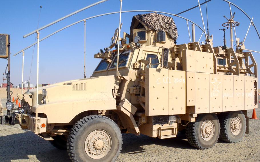 The last vehicle out of Iraq rolls to a stop at Camp Virginia, Kuwait, Dec. 18, 2011. A similar version of this Caiman Mine Resistant Ambush Protected vehicle has found a new home with the Portsmouth, Ohio Police Department, at a cost of $5,200.