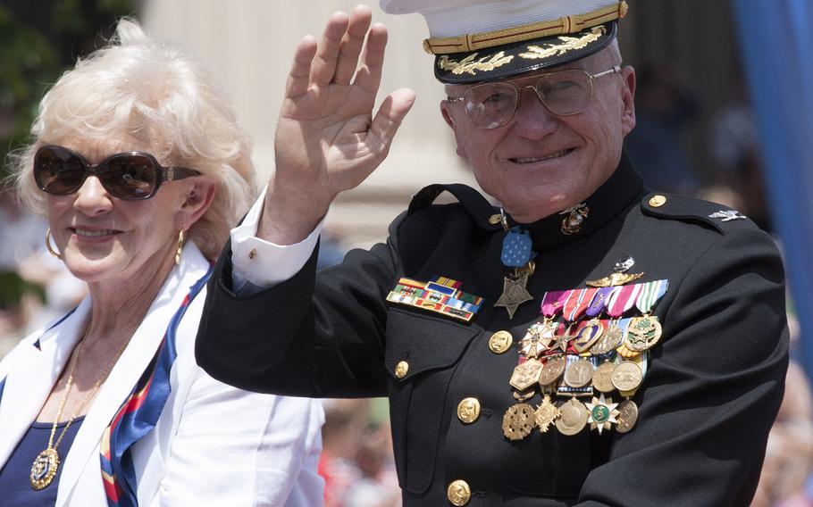 Retired Marine Corps Col. Wesley L. Fox, a Vietnam War Medal of Honor recipient, rides in the National Memorial Day Parade in Washington, D.C., May 26, 2014.