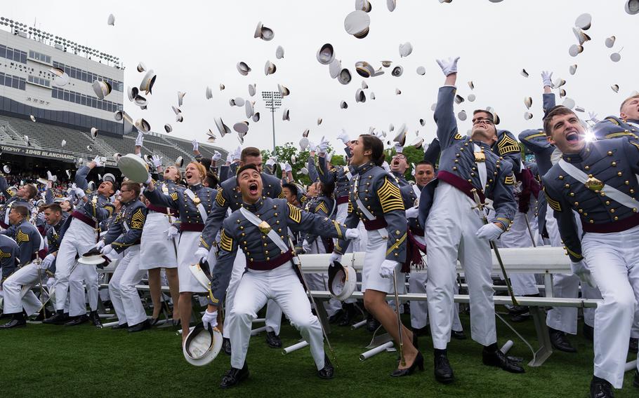 Newly commissioned second lieutenants participate in the traditional hat toss at the end of the 2014 commencement ceremony at the U.S. Military Academy at West Point, N.Y., May 28, 2014. 