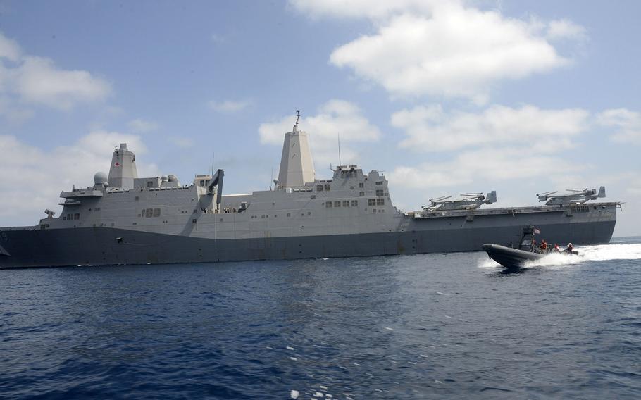 Sailors assigned to the amphibious transport dock ship USS Mesa Verde operate a rigid-hull inflatable boat during small boat operations training in the Gulf of Aden, March 22, 2014.

