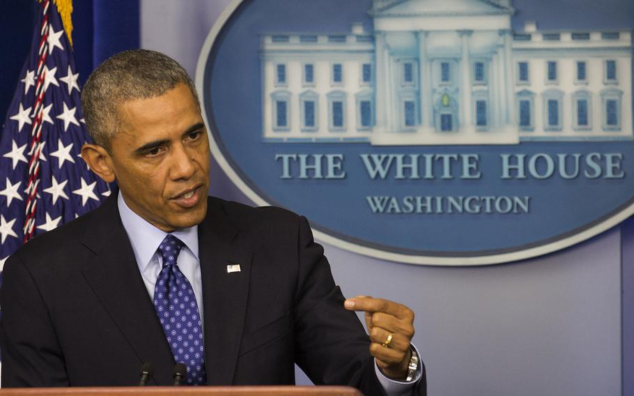 President Barack Obama talks about the situation in Iraq during a news conference Thursday, June 19, 2014, at the White House.