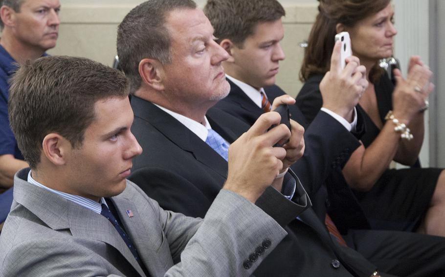 Kyle Carpenter's family was in the audience as the newest Medal of Honor recipient spoke to reporters in the White House briefing room, June 19, 2014.