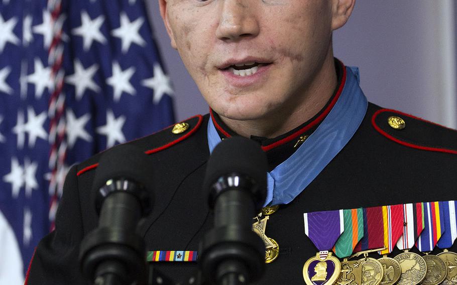 Retired Marine Corps Cpl. Kyle Carpenter speaks to reporters in the White House briefing room after his Medal of Honor ceremony, June 19, 2014.