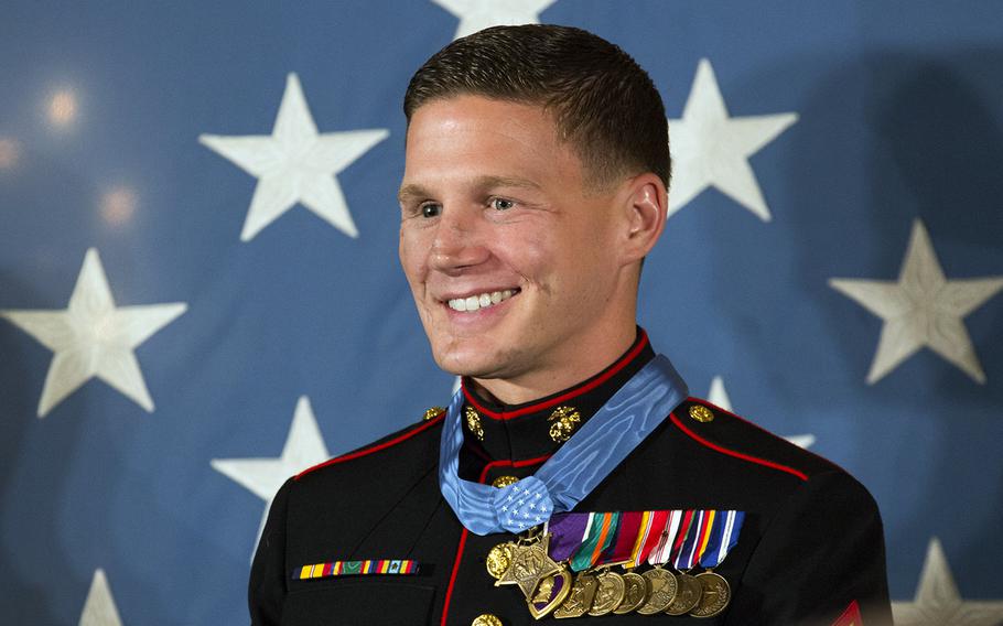 Retired Marine Corps Cpl. Kyle Carpenter smiles after receiving the Medal of Honor at the White House, June 19, 2014.