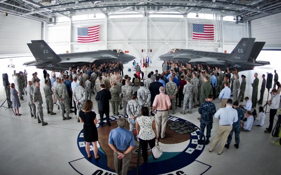 Defense Secretary Chuck Hagel addresses 33rd Fighter Wing service members during a troop call at Eglin Air Force Base, Fla., on July 10, 2014. Hagel visited the base to tour the wing and the F-35 Lightning II integrated training center.