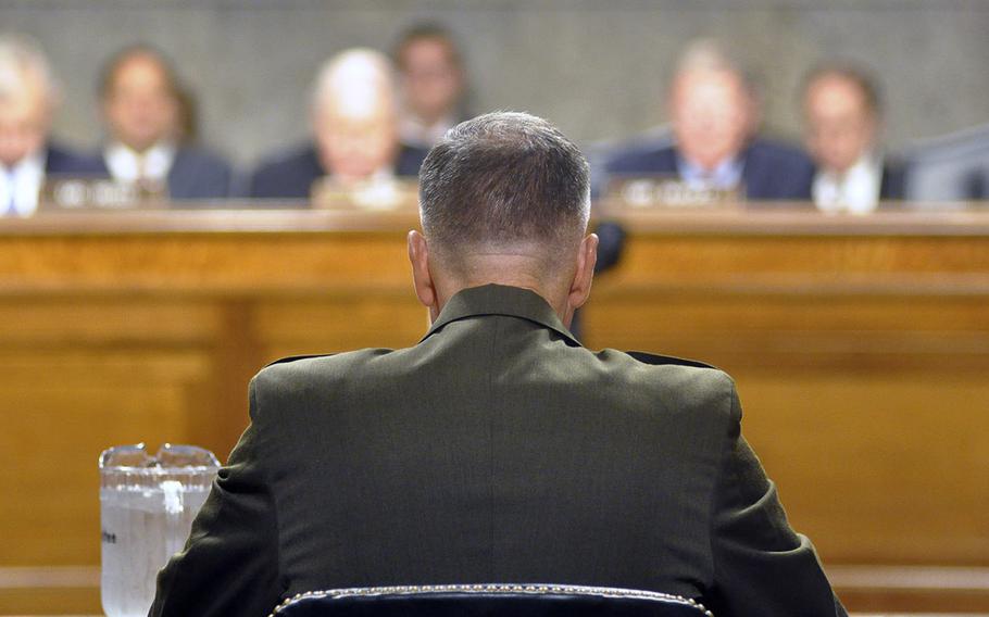 Marine Corps Gen. Joseph F. Dunford, Jr., testifies during a U.S. Senate hearing on Capitol Hill in Washington on Thursday, July 17, 2014. Members of the Committee on Armed Services were considering Dunford's nomination to be the next Commandant of the Marine Corps.