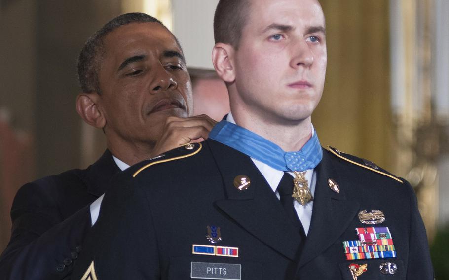 President Barack Obama awards former Army Staff Sgt. Ryan Pitts the Medal of Honor at the White House, July 21, 2014.