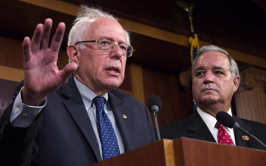 Sen. Bernie Sanders, I-Vt., left, and Rep. Jeff Miller, R-Fla., chairmen of the Senate and House Veterans Affairs Committees, talk to reporters at the Capitol, July 28, 2014.