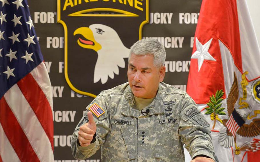 Gen. John F. Campbell holds a news conference at the Kinnard Mission Training Complex at Fort Campbell, Kentucky, Aug. 1, 2013.