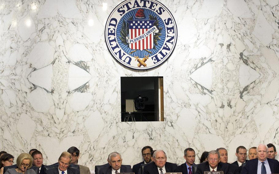 Members of the Senate Armed Forces Committee question Chairman of the Joint Chiefs of Staff Gen. Martin Dempsey and Secretary of Defense Chuck Hagel during a hearing on Capitol Hill, Sept. 16, 2014.
