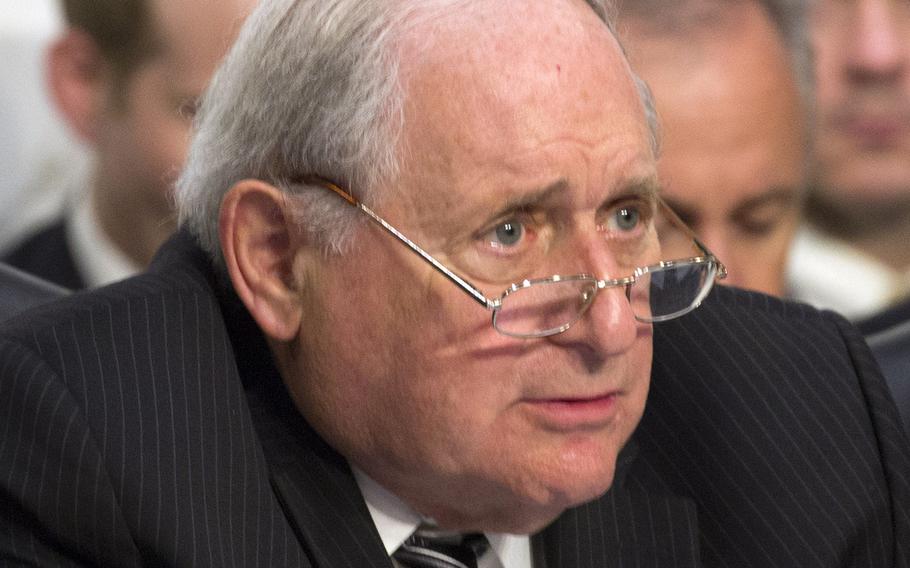 Sen. Carl Levin, D-Mich., chairman of the Senate Armed Forces Committee, questions Secretary of Defense Chuck Hagel and Chairman of the Joint Chiefs of Staff Gen. Martin Dempsey during a hearing on Capitol Hill, Sept. 16, 2014.
