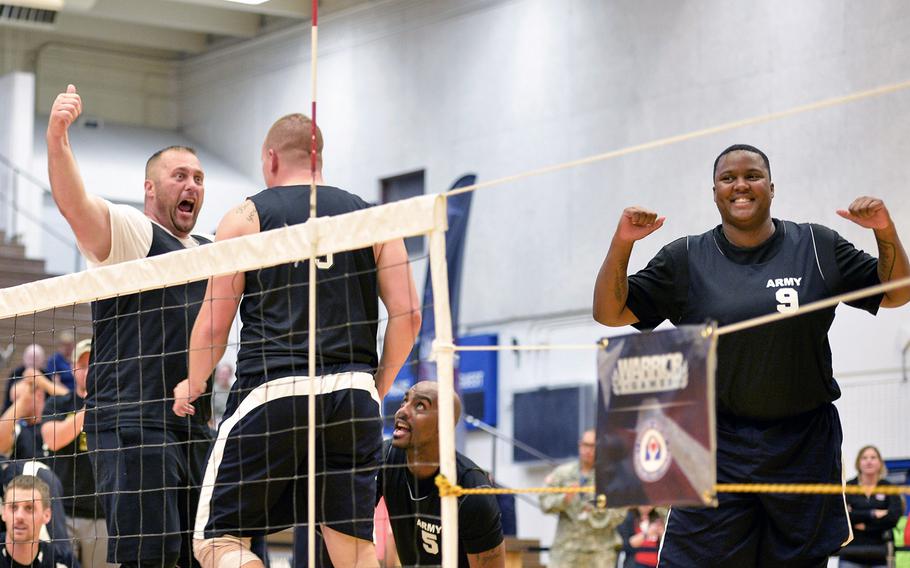 The Army sitting volleyball team celebrates after winning the sitting volleyball bronze medal match against the Air Force at the U.S. Olympic Training Center in Colorado Springs, Colo., on Oct. 1. The Army beat the Air Force in two sets, 25-20 and 25-19. 