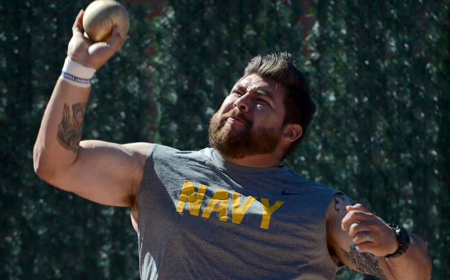 A member of the Navy team throws the shot put during the track and field competition at the Warrior Games in Colorado Springs, Colo., on Oct. 2, 2014.