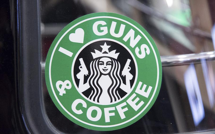 A sticker showing the love for guns on the Volkswagen van displayed at Magpuls' booth at AUSA's annual expo in Washington, D.C. on Oct. 15, 2014.