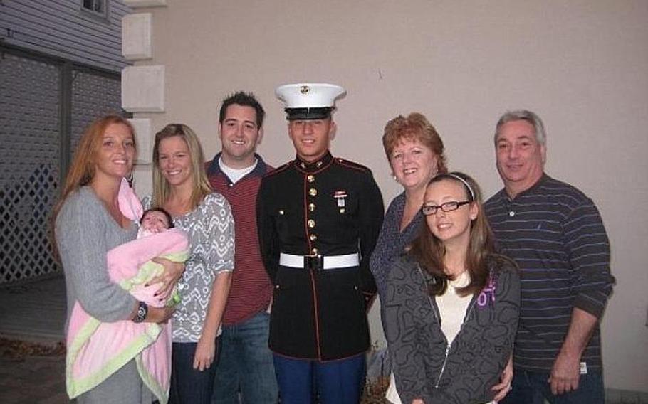 Lance Cpl. Gregory Buckley Jr. with family. Laura Grosseto is at the far left, while aunt Mary Liz Grosseto is to the right of Buckley.