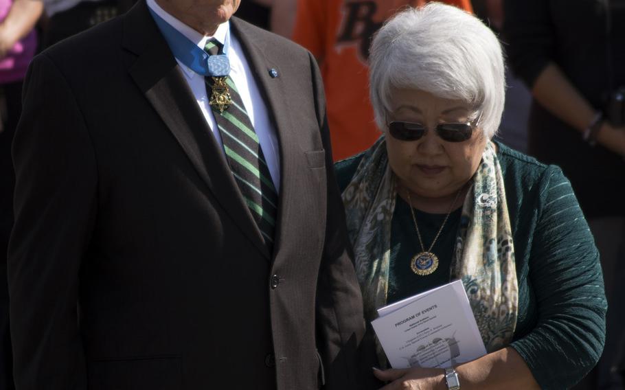 Medal of Honor recipient and Vietnam veteran Roger Donlon stands with his wife Norma during the Wreath Laying Ceremony at JFK's grave at Arlington National Cemetery on Oct. 21, 2014.