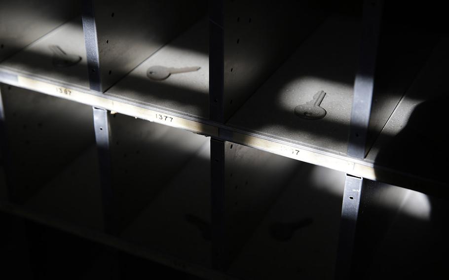 This Oct. 2, 2014, photo shows dusty keys in the mail slots of a hospital basement post office at the former Mare Island Naval Shipyard in Vallejo, Calif. The shipyard dates from the 1850s and was the first U.S. Navy base in the Pacific. At its peak in World War II some 50,000 worked on the island. Today about 4,000 either work, live or go to school there. A number of its buildings and facilities are still empty following the closing of the shipyard in 1996. 
