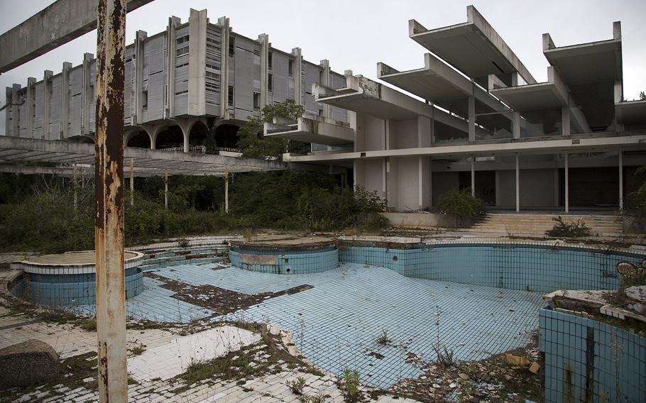 This Oct. 23, 2014, photo shows a swimming pool at the abandoned Palace hotel at deserted tourist resort of Haludovo, near Malinska on the northern Adriatic island of Krk, Croatia. The resort was built as a joint venture of Yugoslav communist government and Bob Guccione, the founder of the Penthouse magazine. The resort was intended as a haven of extreme decadence for upscale vacationers on the Adriatic Sea. Today, it sits abandoned due to ownership issues and mismanagement.