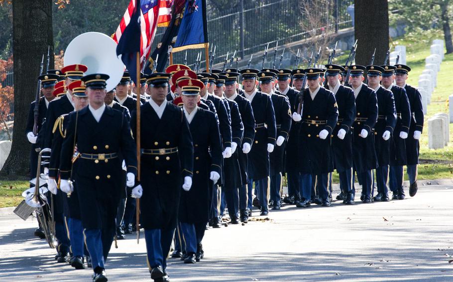 An honor guard precedes the casket of Army Pvt. Miguel A. Vera, at Arlington National Cemetery on Nov. 20, 2014. Vera, who was killed in the Korean War, was one of 24 soldiers awarded the Medal of Honor in March after being previously overlooked because of their racial or ethnic backgrounds. Vera was originally buried in Puerto Rico.