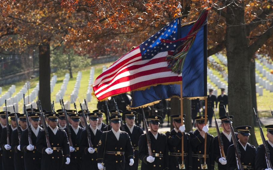 An honor guard precedes the casket of Army Pvt. Miguel A. Vera, at Arlington National Cemetery on Nov. 20, 2014. Vera, who was killed in the Korean War, was one of 24 soldiers awarded the Medal of Honor in March after being previously overlooked because of their racial or ethnic backgrounds. Vera was originally buried in Puerto Rico.
