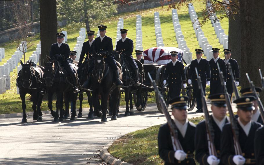 The caisson carrying the remains of Army Pvt. Miguel A. Vera arrives at the burial site at Arlington National Cemetery on Nov. 20, 2014. Vera, who was killed in the Korean War, was one of 24 soldiers awarded the Medal of Honor in March after being previously overlooked because of their racial or ethnic backgrounds. Vera was originally buried in Puerto Rico.