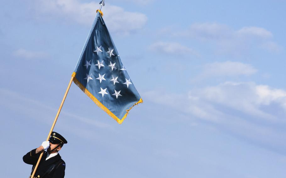 An honor guard carries the Medal of Honor flag at the burial ceremony for Army Pvt. Miguel A. Vera at Arlington National Cemetery on Nov. 20, 2014. Vera, who was killed in the Korean War, was one of 24 soldiers awarded the Medal of Honor in March after being previously overlooked because of their racial or ethnic backgrounds. Vera was originally buried in Puerto Rico.