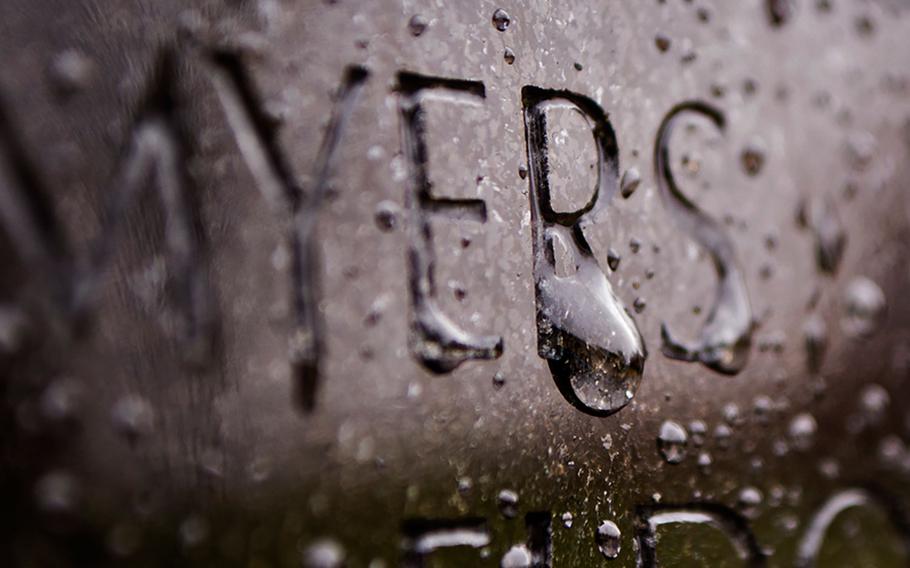 A rain drops on a name on the Vietnam Veterans Memorial Wall in Washington, D.C., on Nov. 26, 2014. 