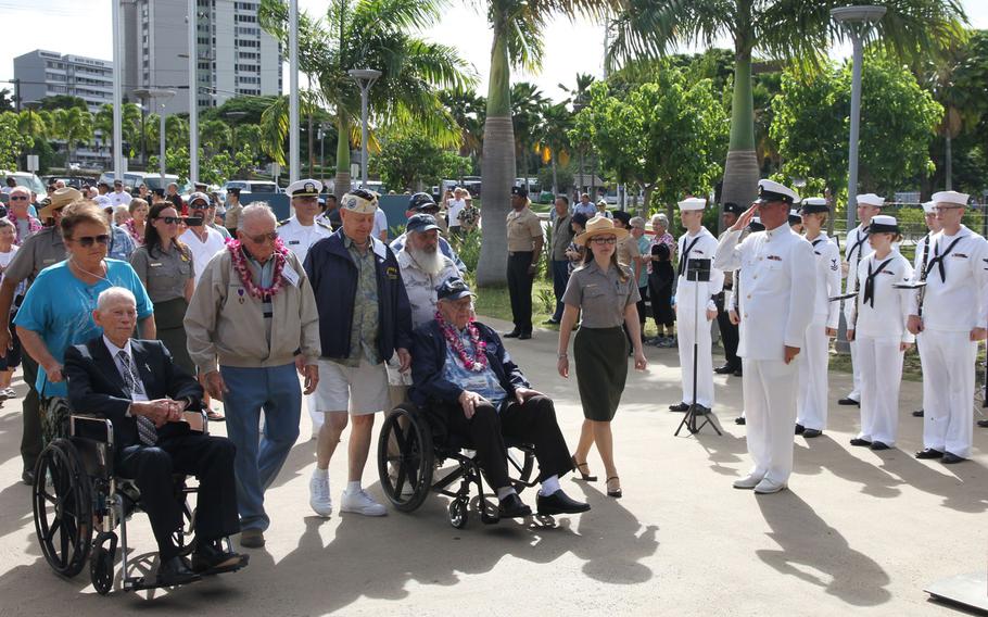 Four of the nine remaining survivors of the USS Arizona arrive at the Pearl Harbor Visitor Center in Honolulu Tuesday for a news conference. The four survivors will gather at the USS Arizona Memorial Sunday, which is the 73rd anniversity of the Dec. 7, 1941, attack on Pearl Harbor, for what they've agreed will be the last official gathering of the group. From left are John Anderson, Donald Stratton, Louis Conter and Lauren Bruner.