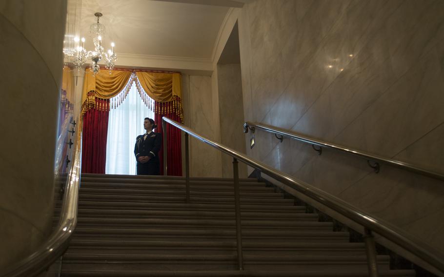 Maj. Stephanie Myers awaits guests during the press preview of the White House holiday decorations on Dec. 3, 2014.