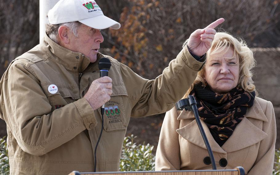Wreaths Across America founder Morrill Worcester speaks at the National 9/11 Pentagon Memorial in Arlington, Va., Dec. 12, 2014. At right is his wife Karen, the organization's executive director.
