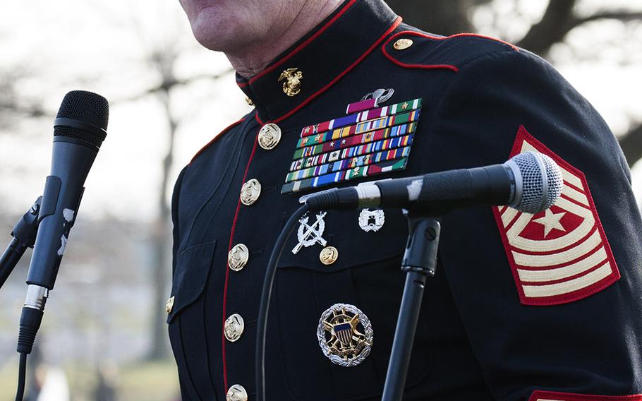 Marine Corps Sgt. Maj. Bryan B. Battaglia, senior enlisted advisor to the chairman of the Joint Chiefs of Staff, speaks at a welcoming ceremony for Wreaths Across America at Arlington National Cemetery, Dec. 13, 2014.
