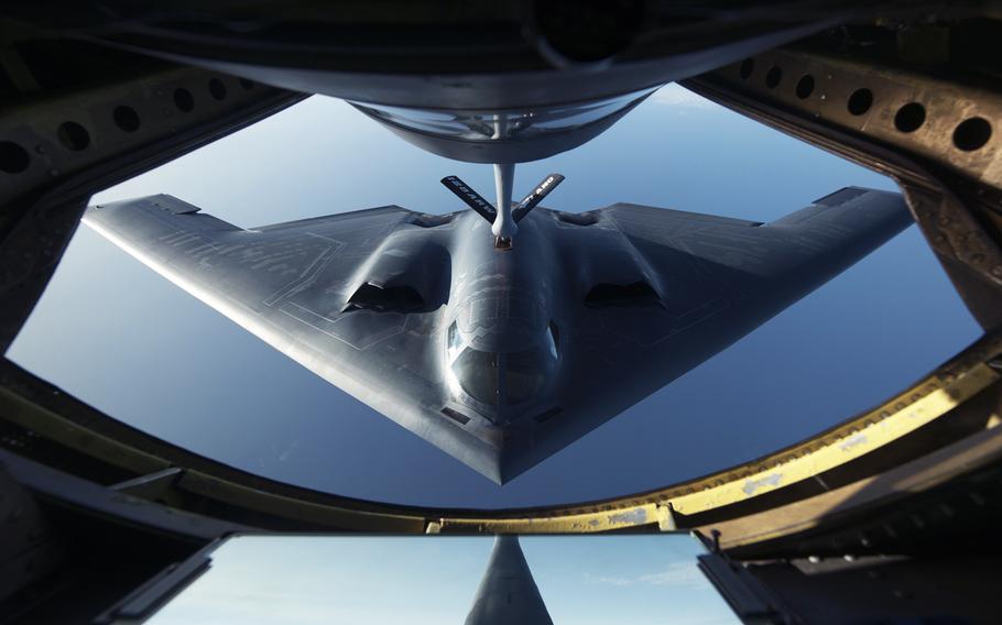 A B-2 Spirit flies into position during a refueling mission over the North Atlantic Ocean June 11, 2014. 